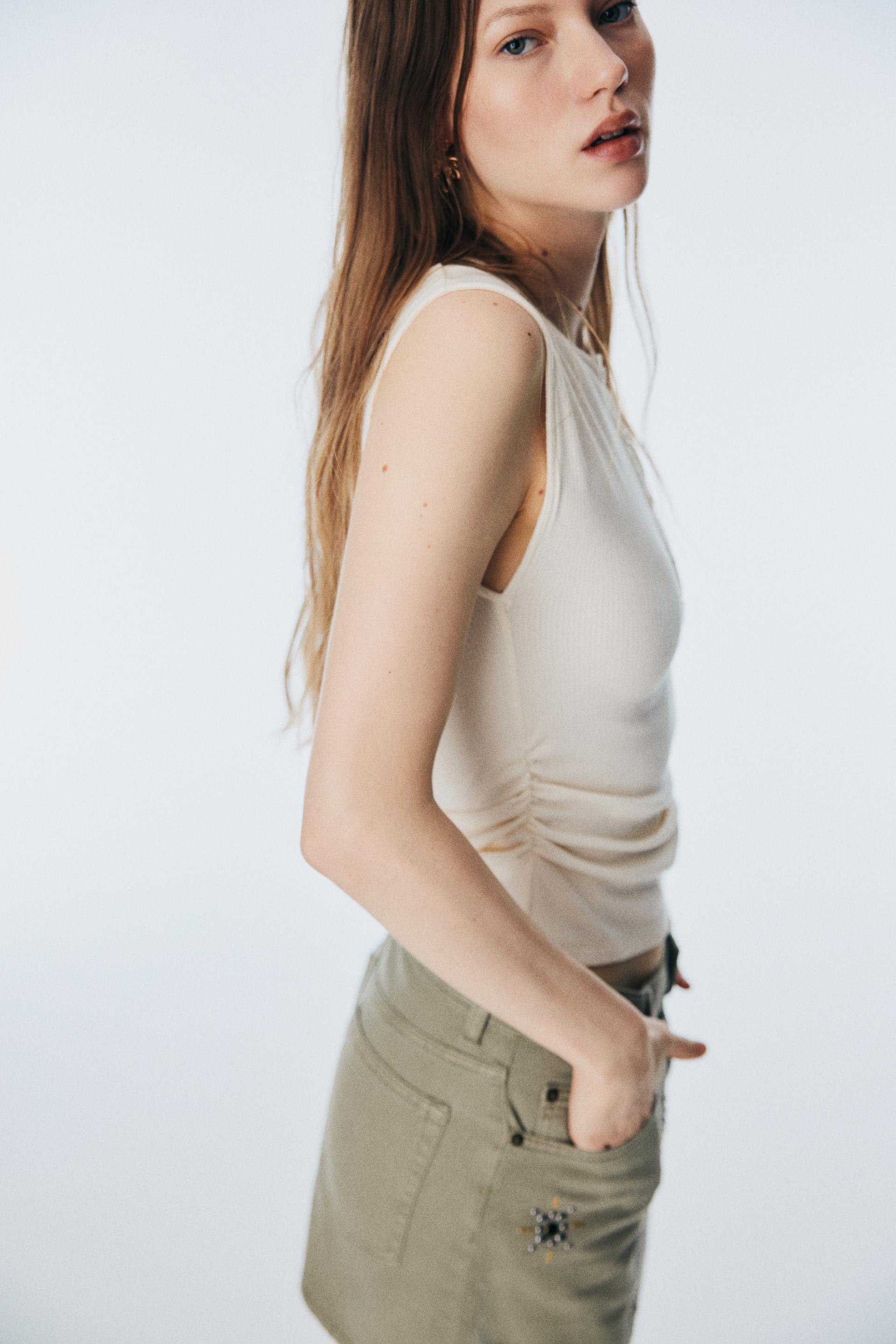 draped sleeveless top