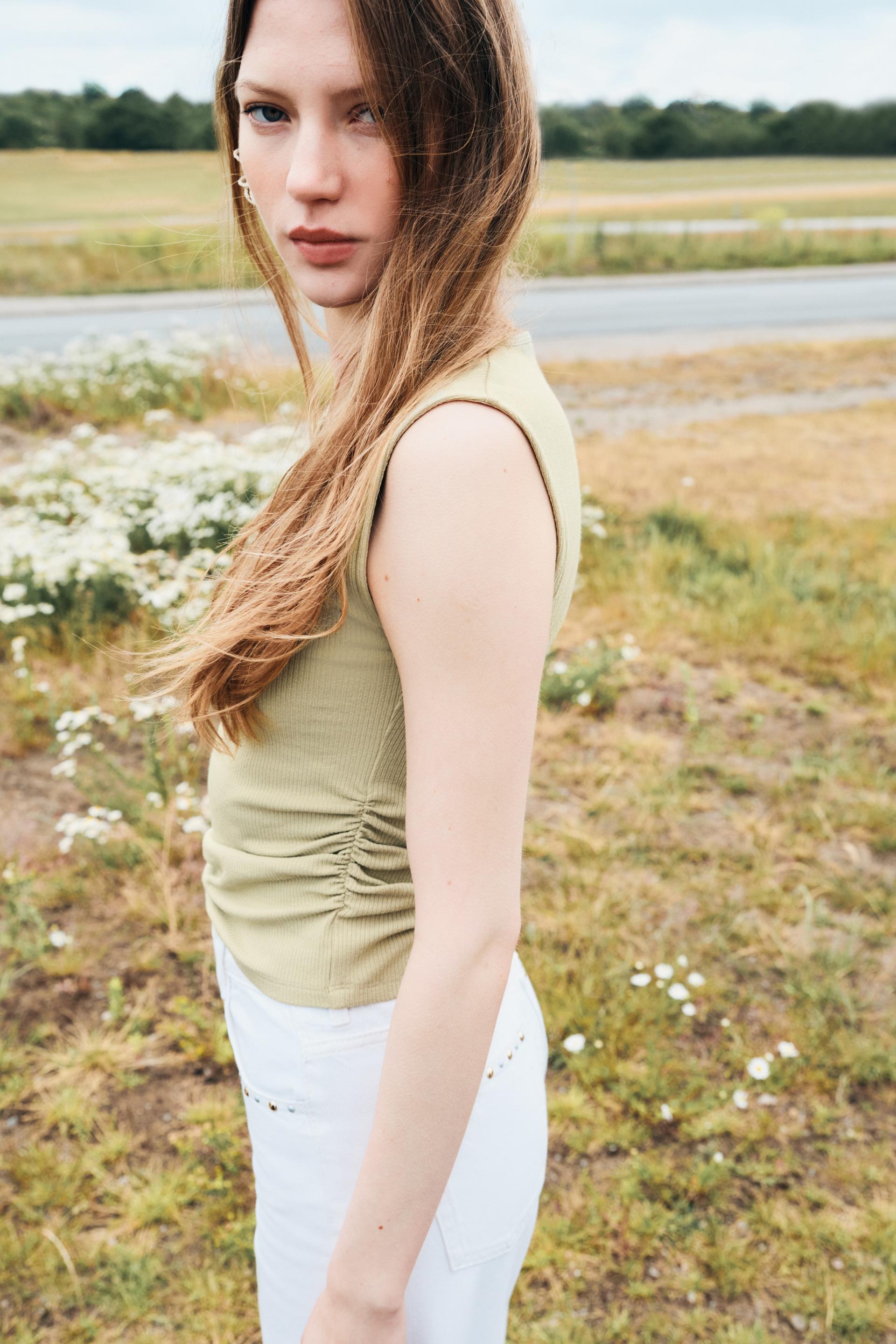 draped sleeveless top