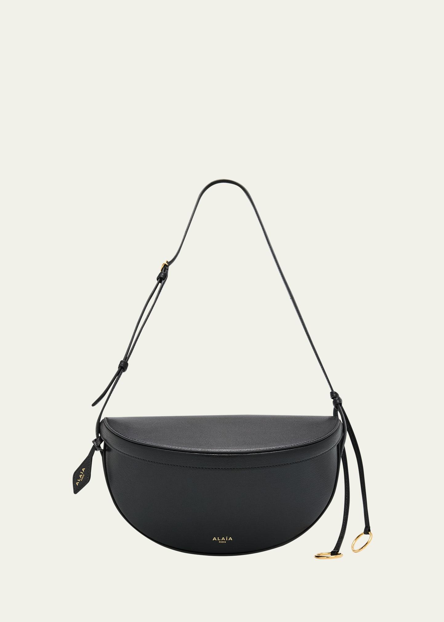 east-west curved goatskin leather shoulder bag