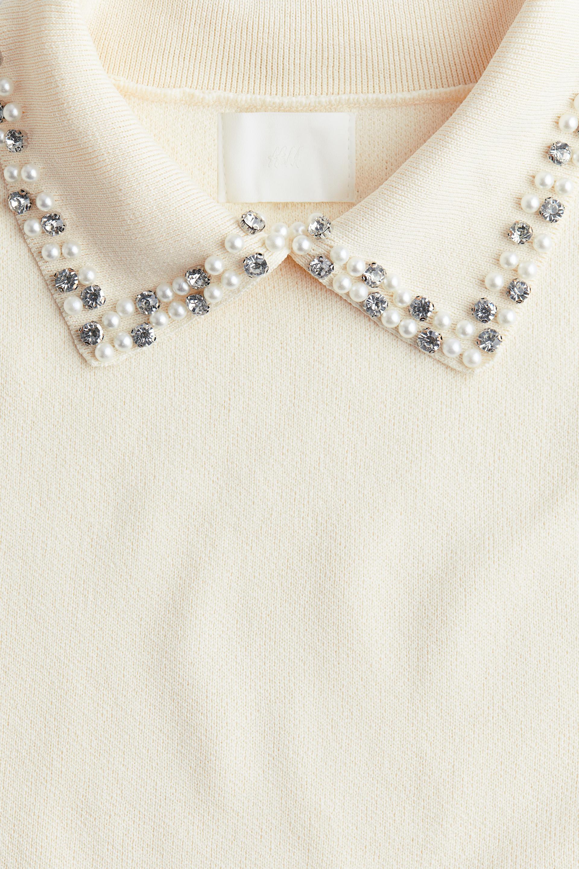 embellished-collar knit top