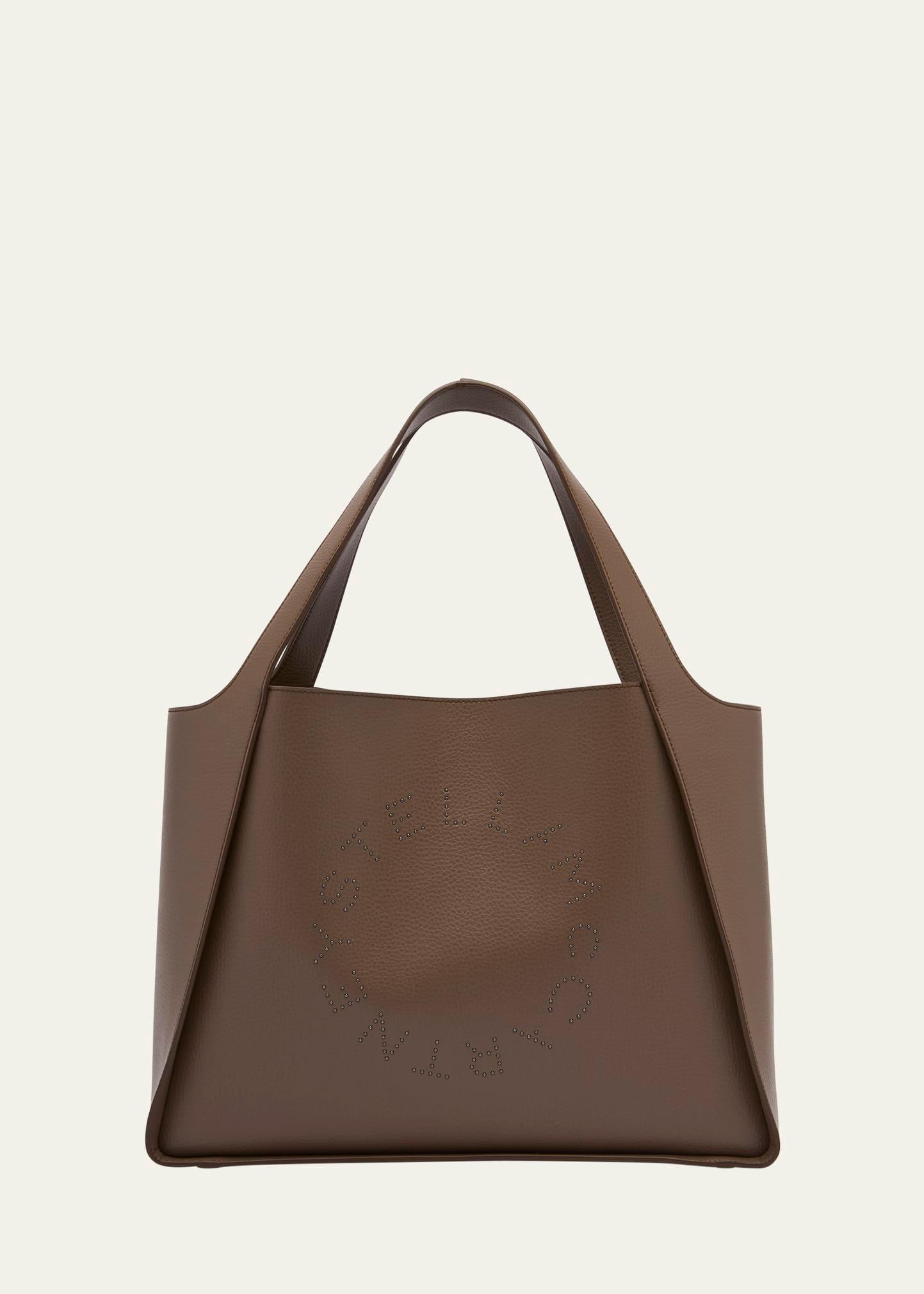 embossed vegan leather studded logo tote bag