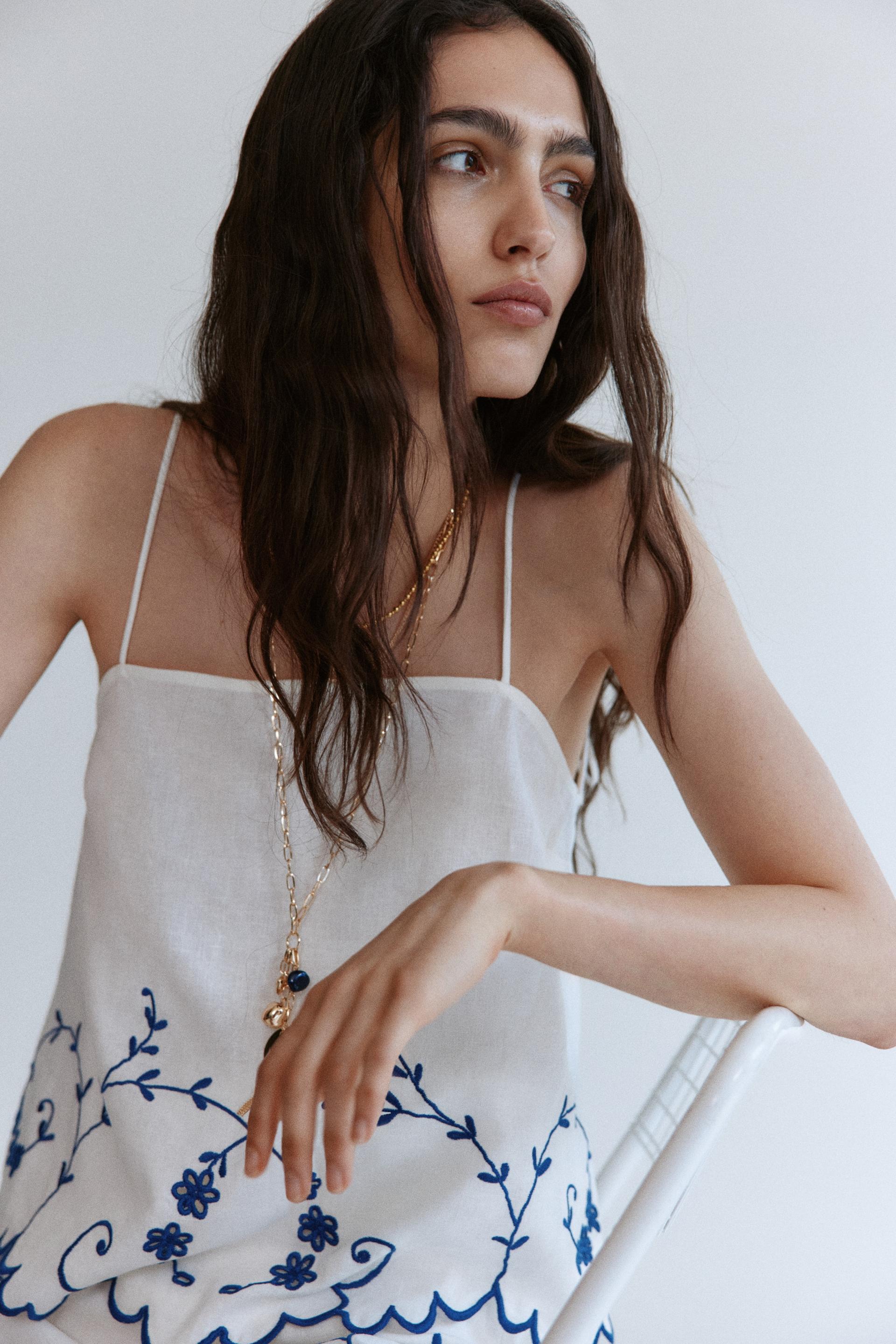embroidered linen-blend top