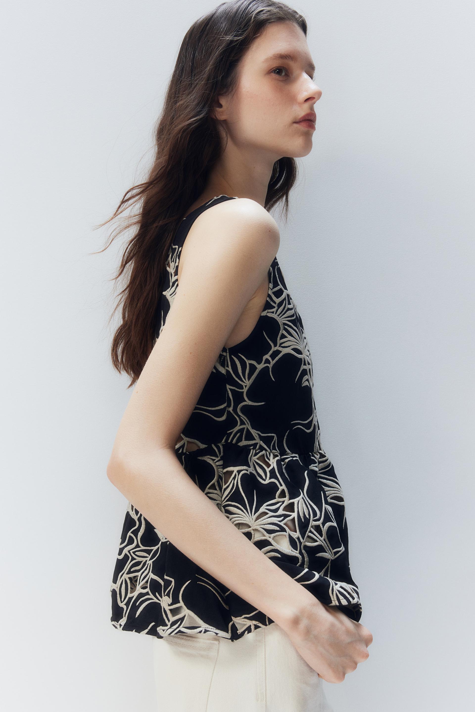 embroidered sleeveless top