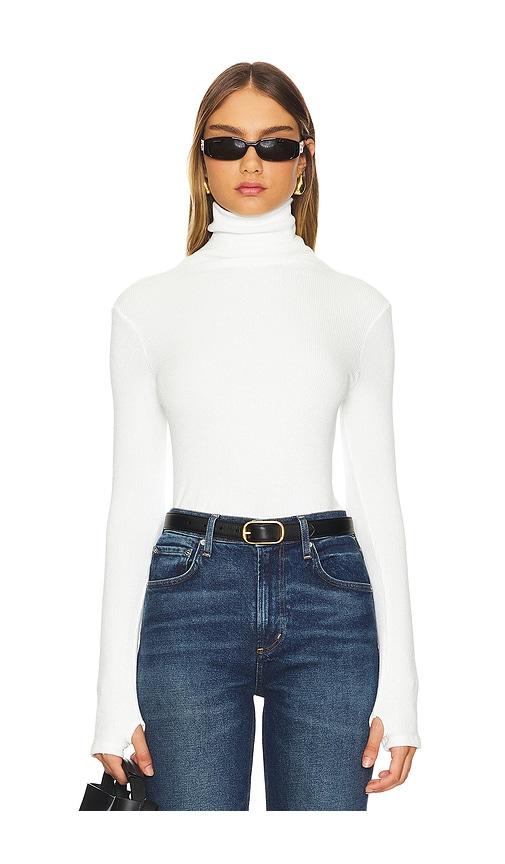 enza costa knit turtleneck in white.