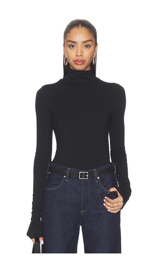 eterne fitted turtleneck top in black.