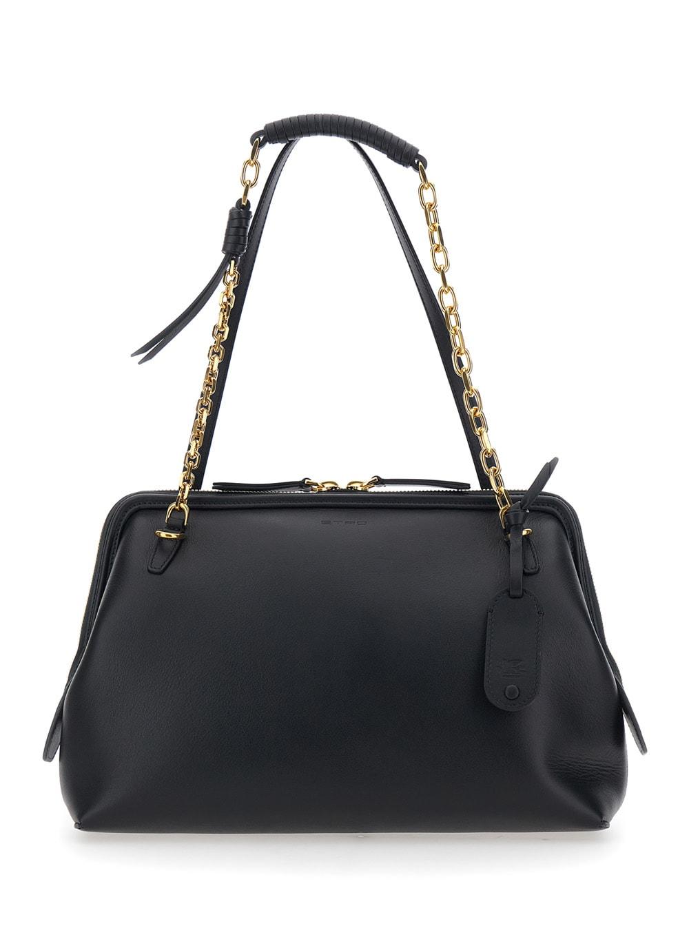 etro black shoulder bag with chain-link shoulder strap and tag with embossed logo on the front in leather woman