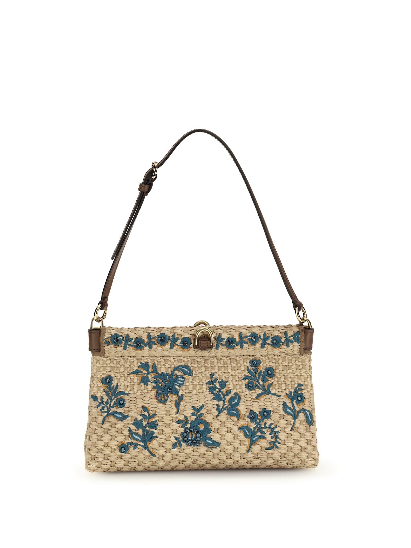 etro floral-embroidered clutch bag