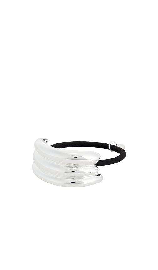 ettika modern rows hair tie in metallic silver.