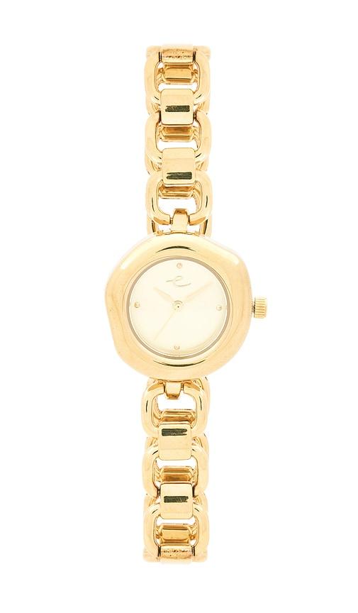 ettika open circle bracelet watch in metallic gold.