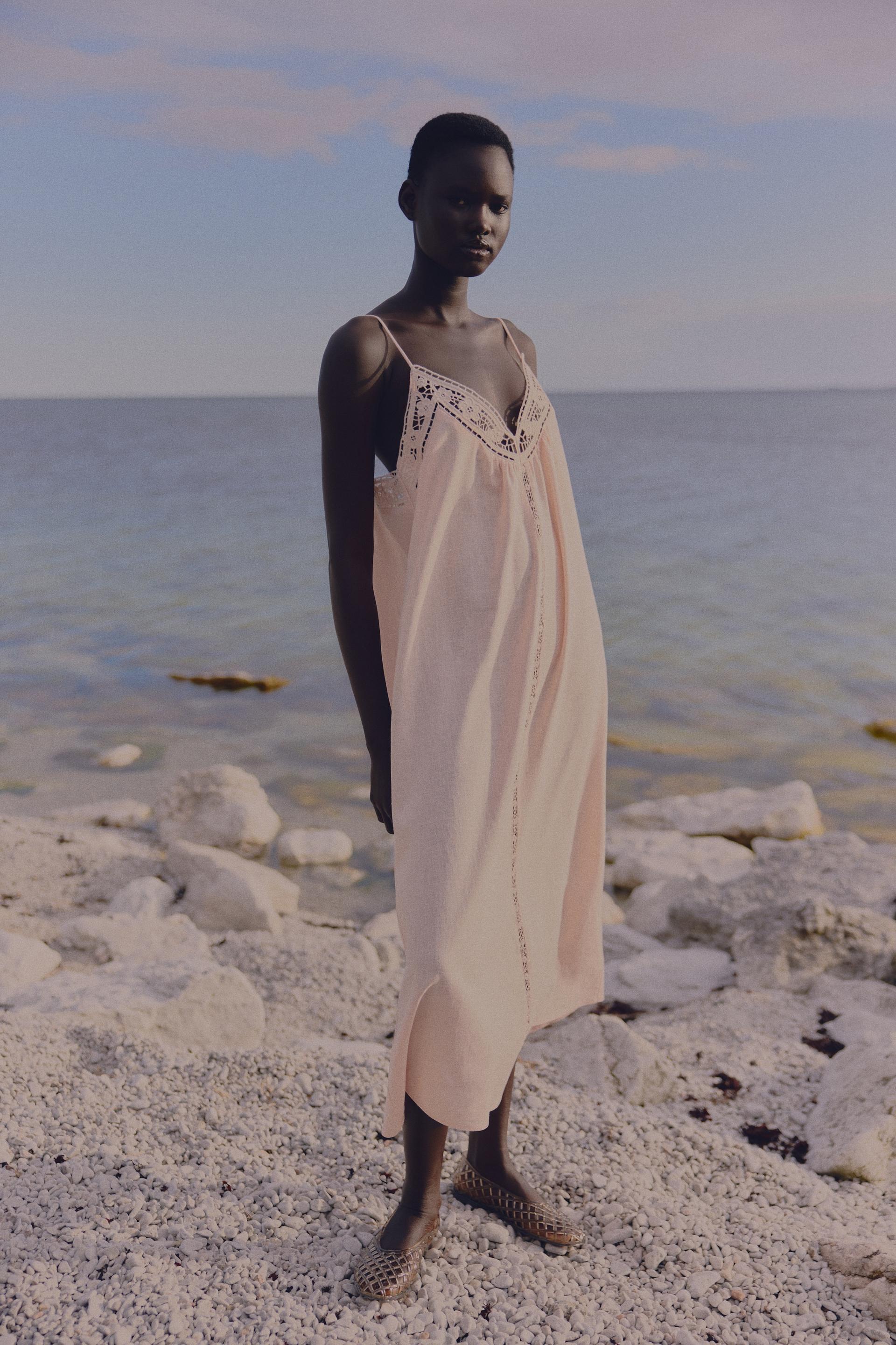 eyelet-embroidered dress with tie shoulder straps