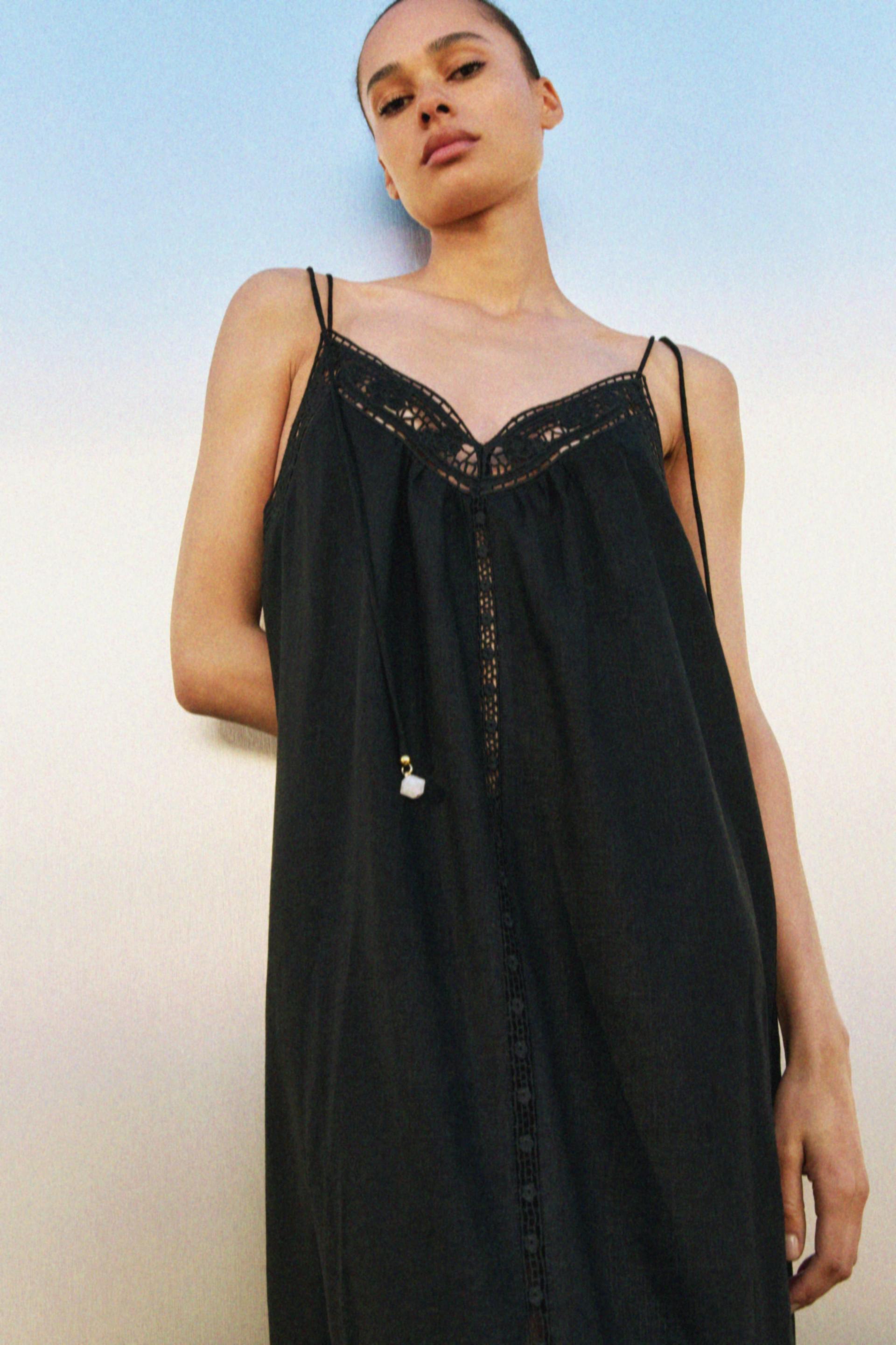 eyelet-embroidered dress with tie shoulder straps