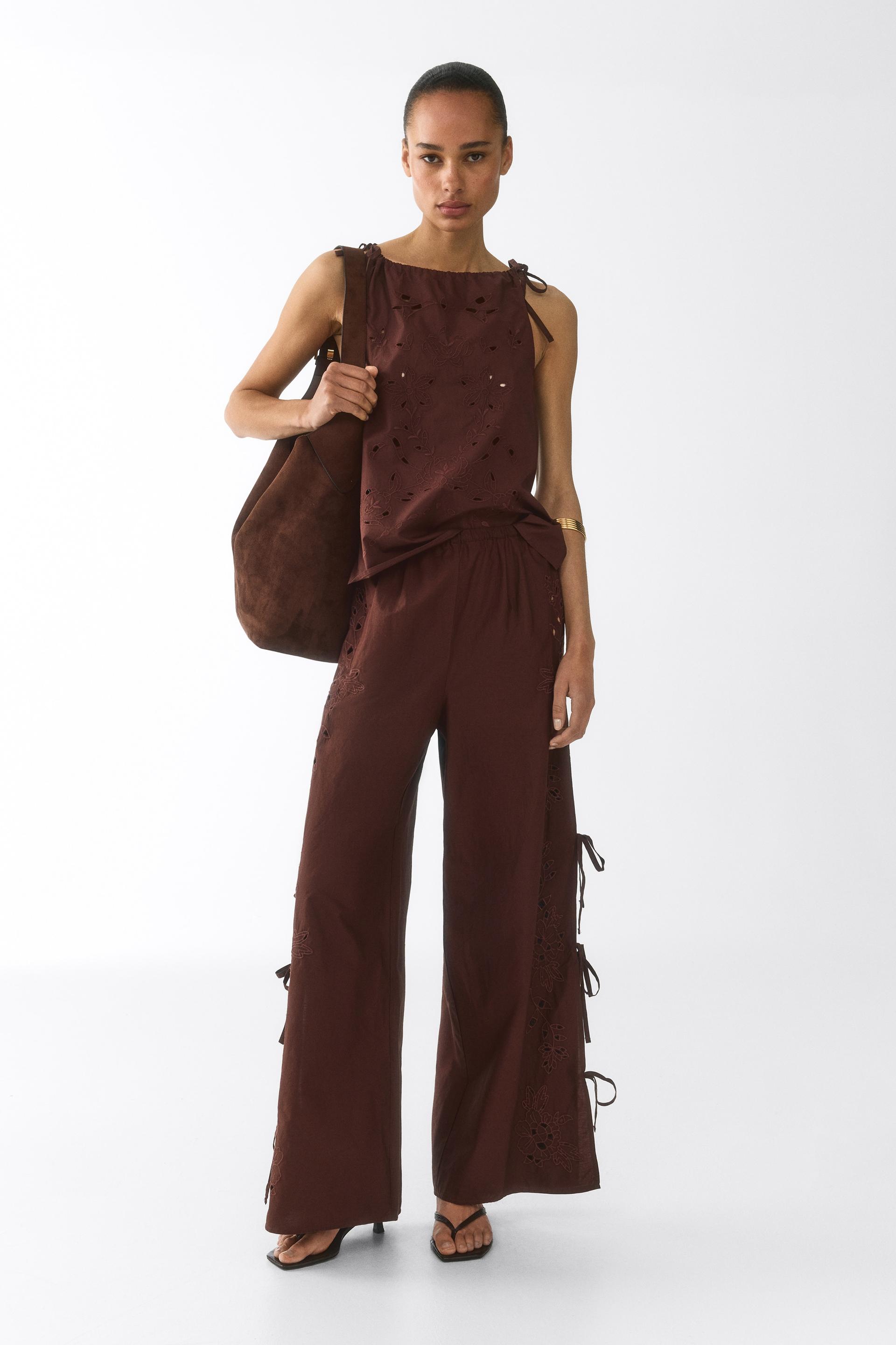 eyelet-embroidered tie-detail pants