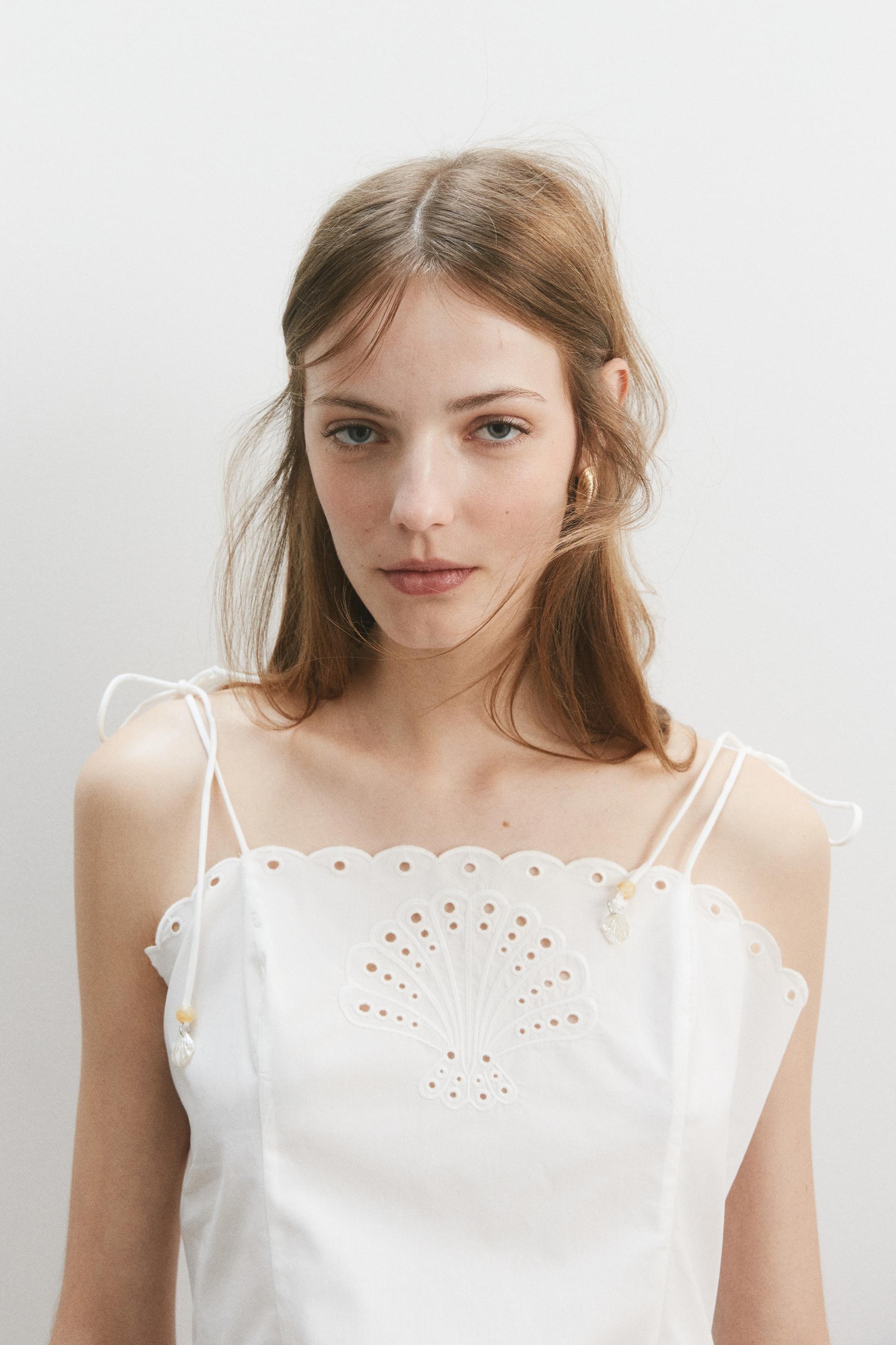 eyelet-embroidered top with tie shoulder straps