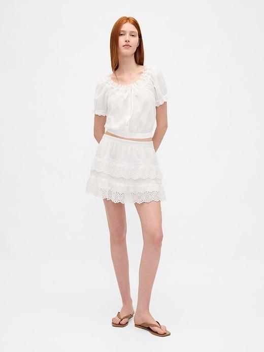 eyelet ruffle mini skort