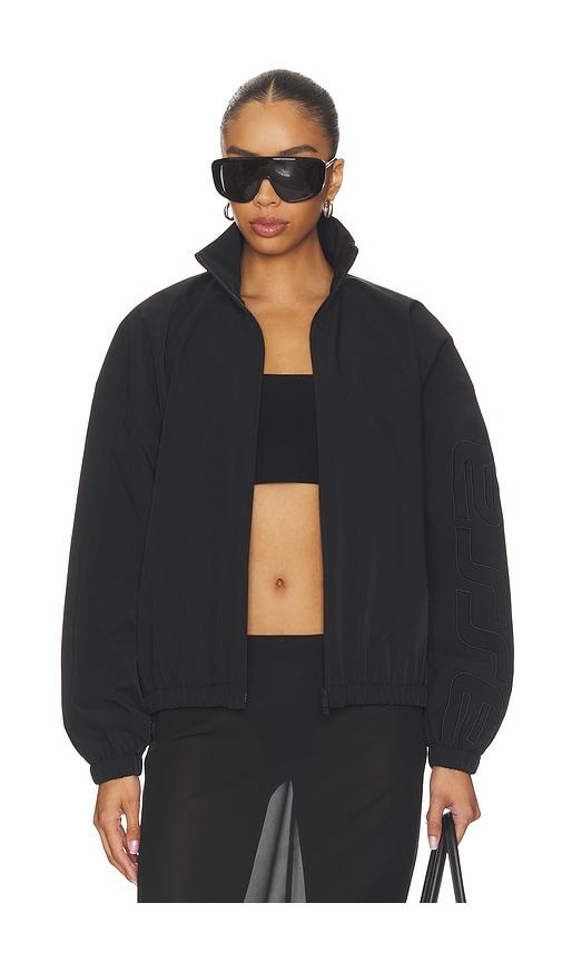 fear of god essentials active trace full zip track jacket in black.