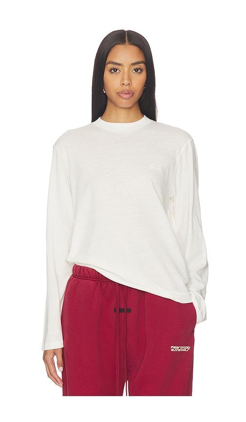 fear of god essentials classic fit long sleeve tee in ivory.
