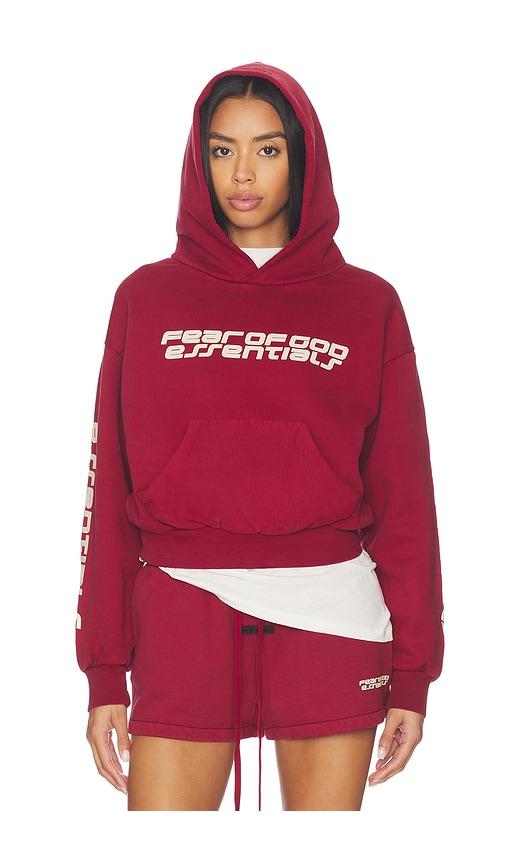 fear of god essentials classic hoodie in red.