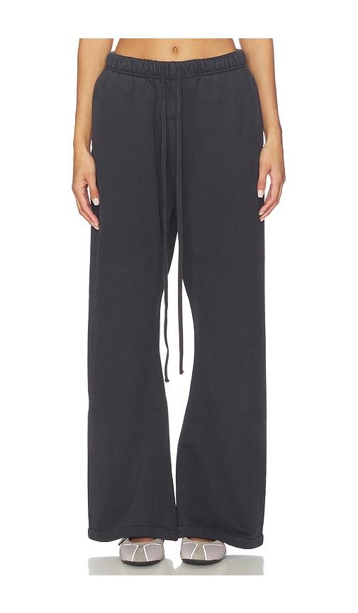 fear of god essentials flare sweatpant in black.