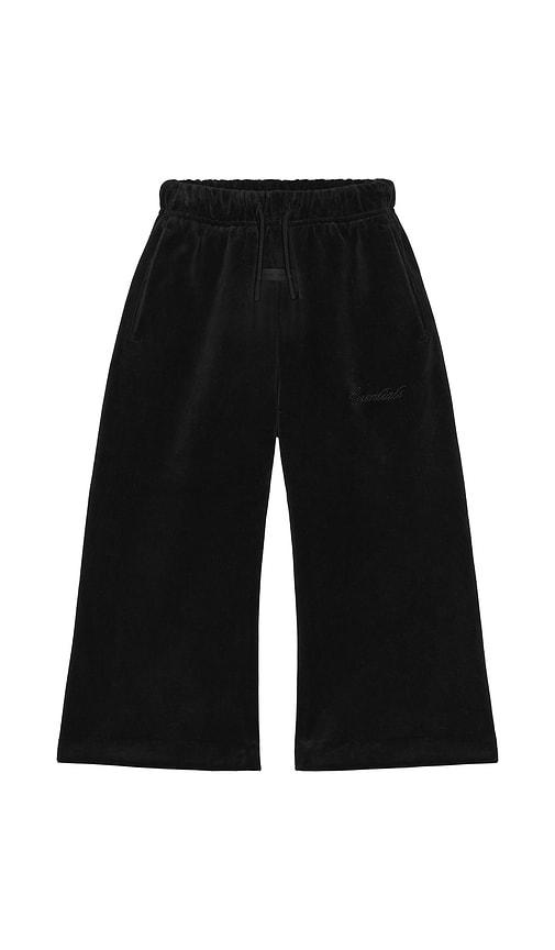 fear of god essentials kids flare pant in black.