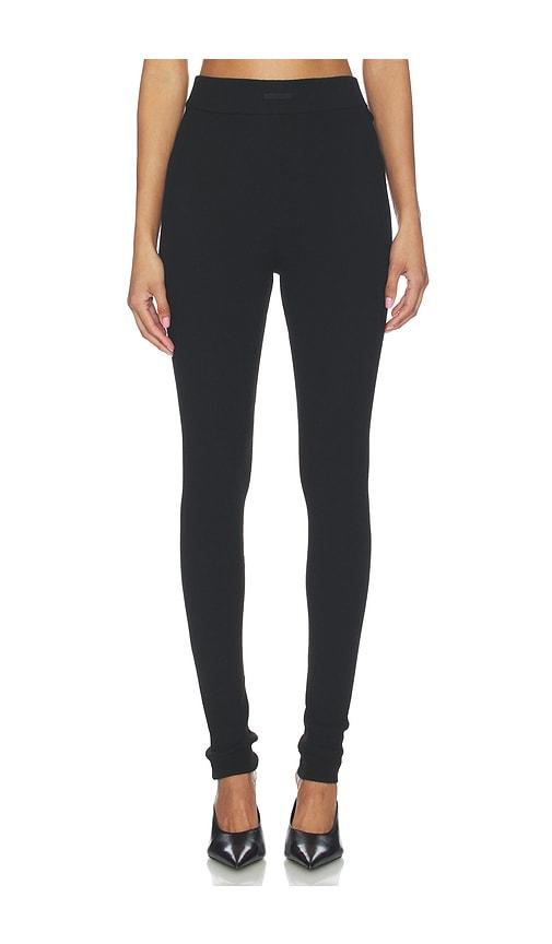 fear of god essentials rib knit legging in black.