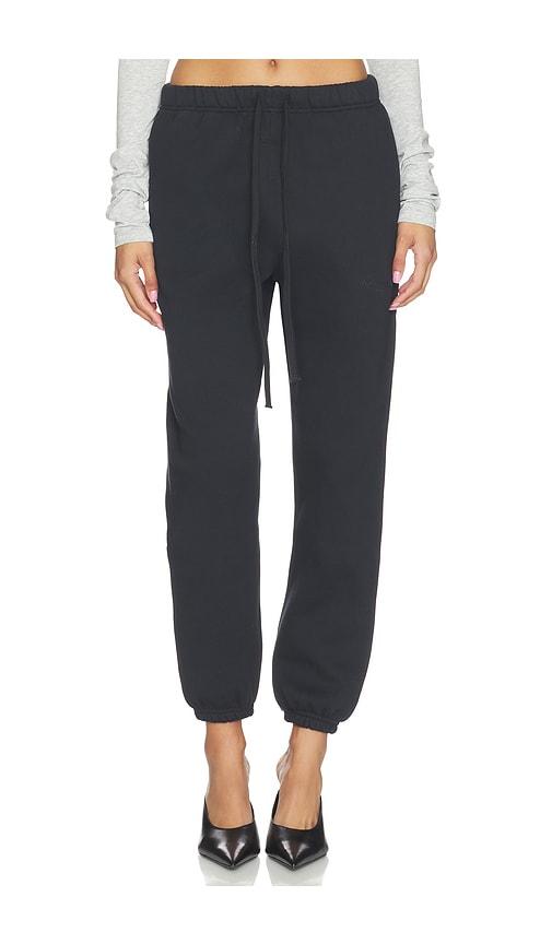 fear of god essentials vintage sweatpant in black.