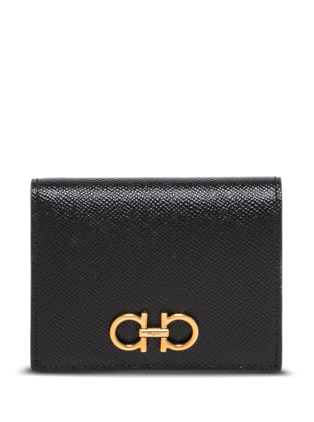 ferragamo gancini black bifold wallet in grained leather woman