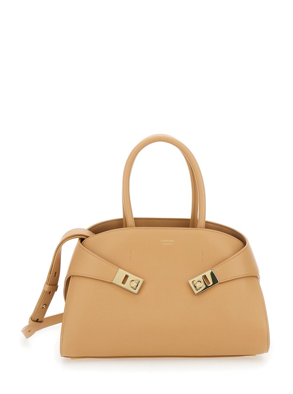 ferragamo hug small beige shoulder bag with logo and gancini buckle in leather woman