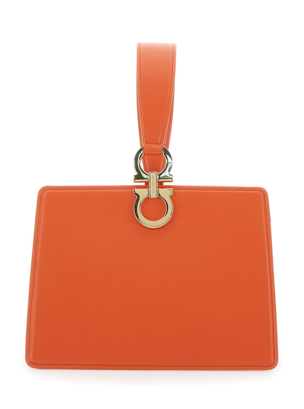 ferragamo orange clutch with gancini clasp and leather handle for women