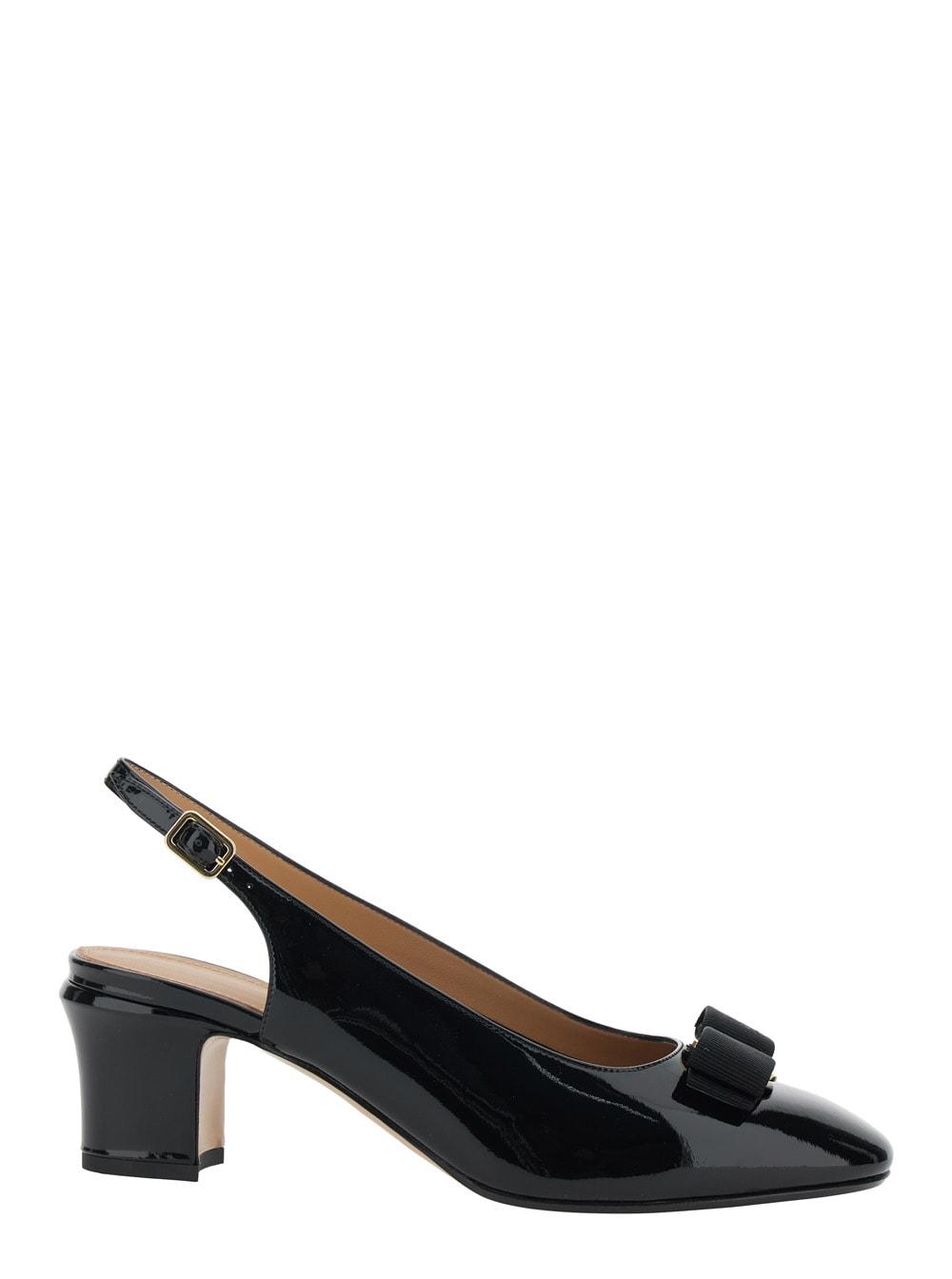 ferragamo vetty black slingback pumps with logo plaque on the front and low block heel in leather woman