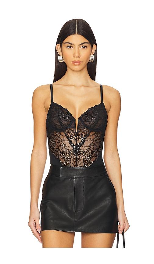 fleur du mal bianca lace bodysuit in black.