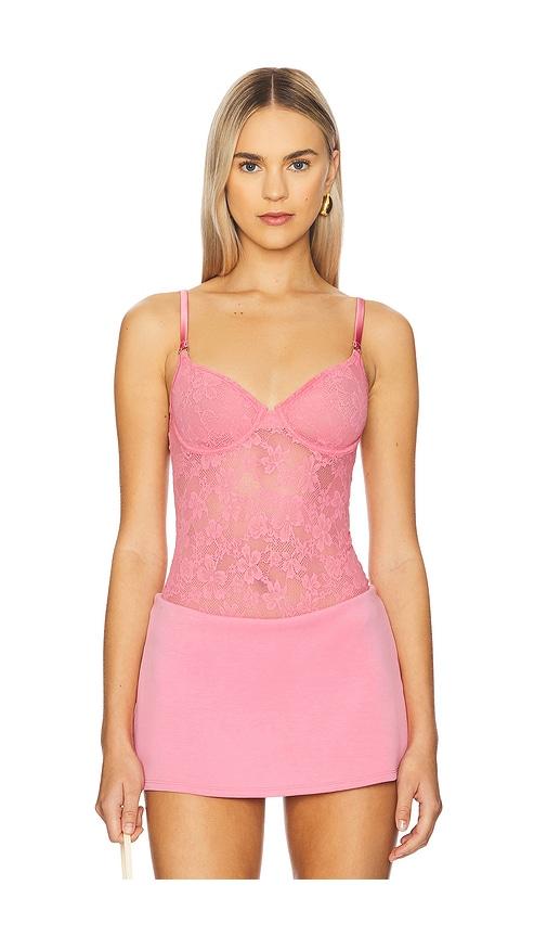 fleur du mal le stretch lace bodysuit in pink.