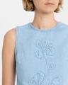floral-embroidered denim top