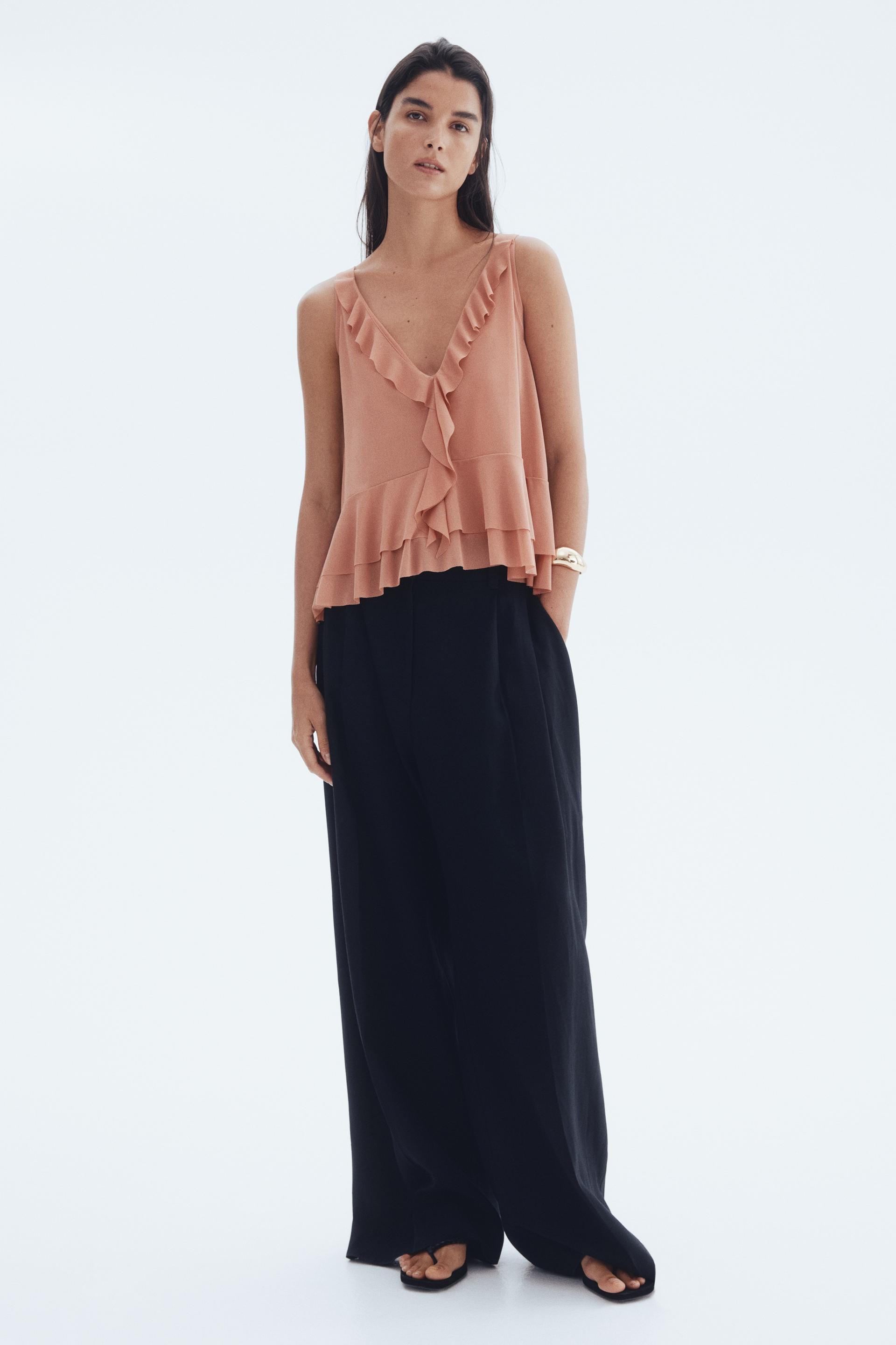 flounced sleeveless top