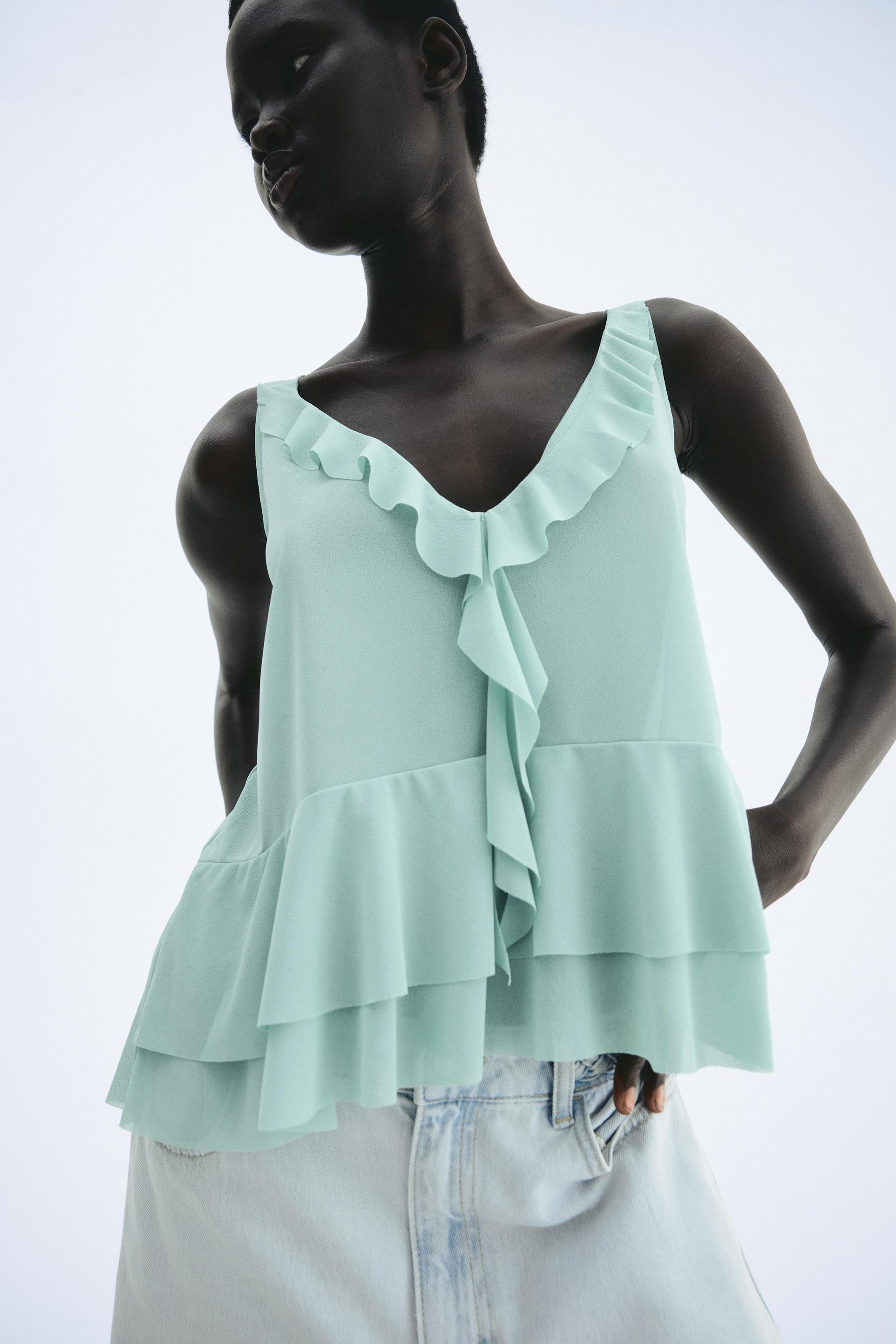 flounced sleeveless top
