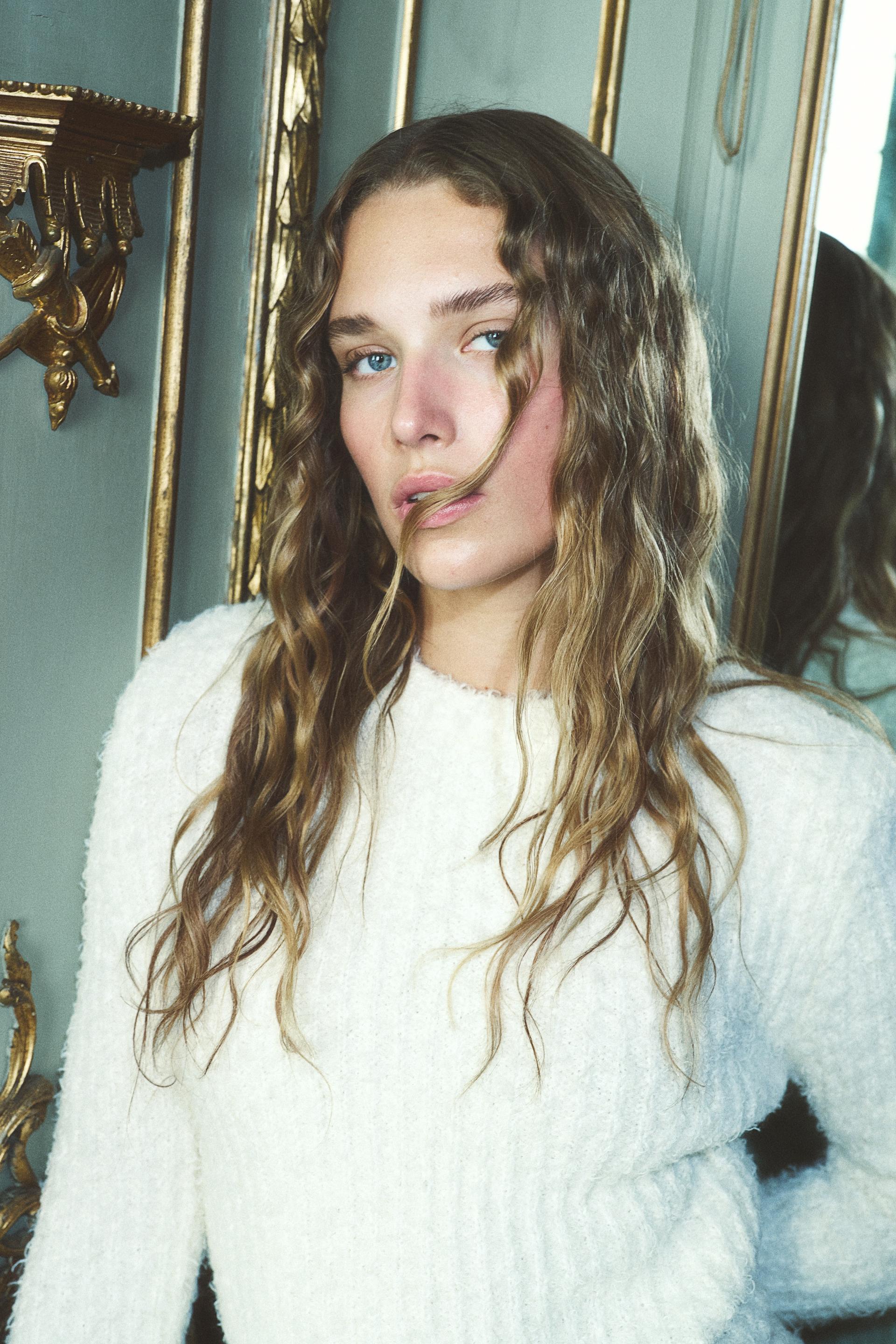 fluffy knit sweater with shoulder pads