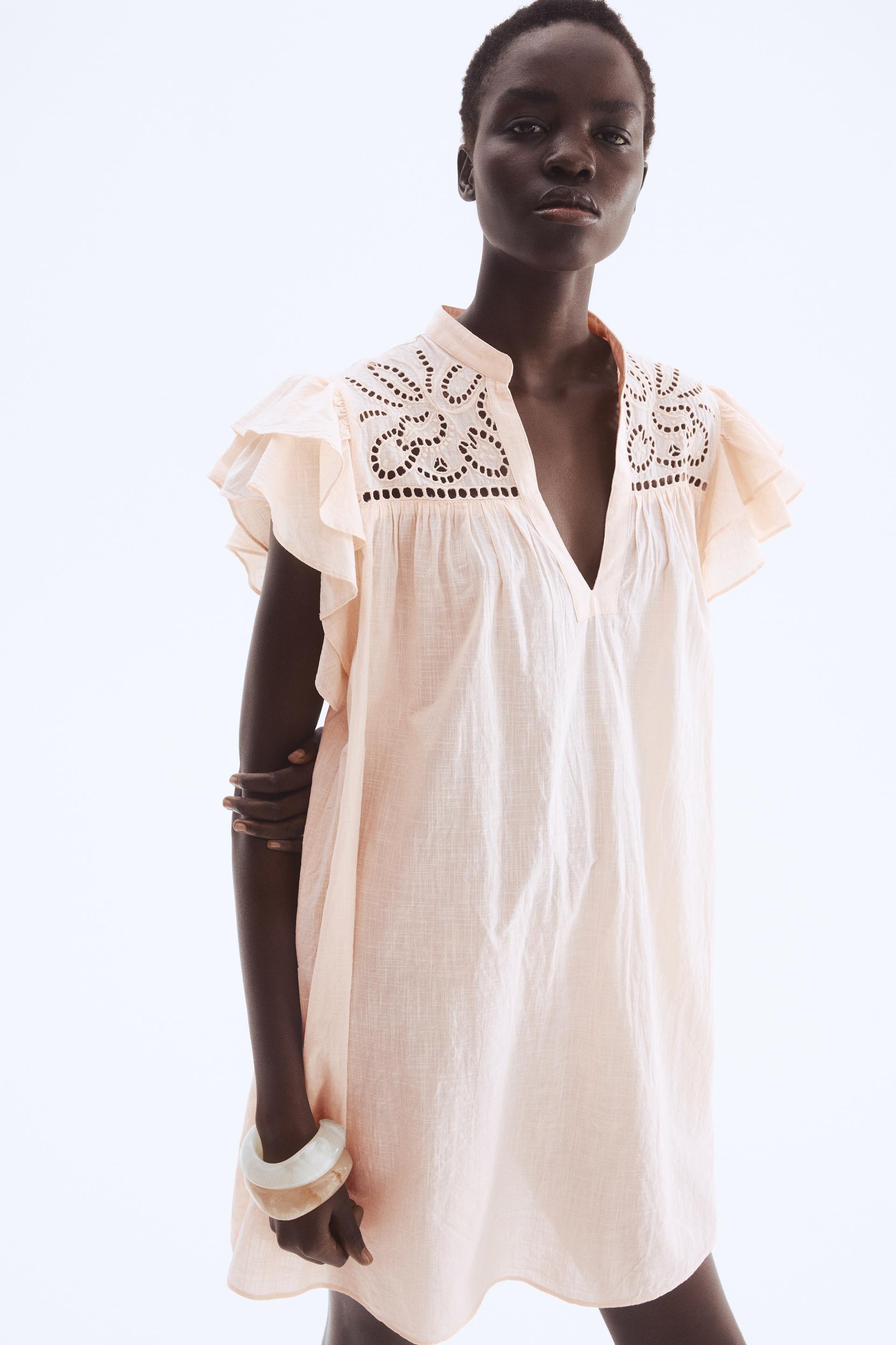 flutter-sleeve dress with eyelet embroidery