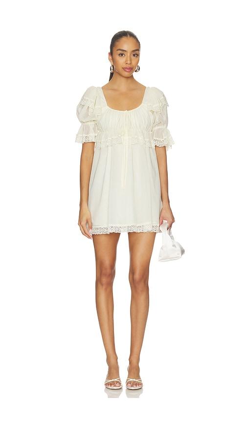 for love & lemons juniper puff sleeve mini dress in yellow.