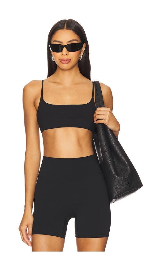 form slim supporter sports bra in black.