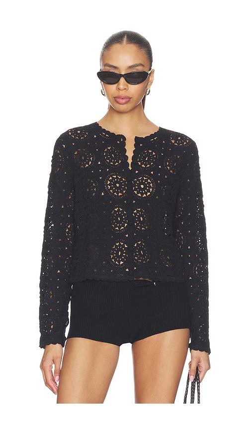 frame the crochet cardi in black.