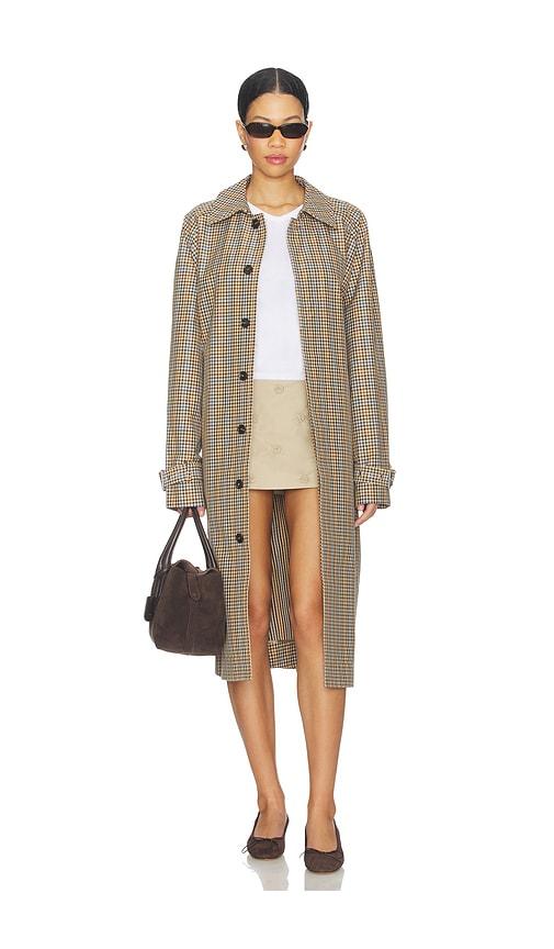 frame the plaid mac coat in brown.