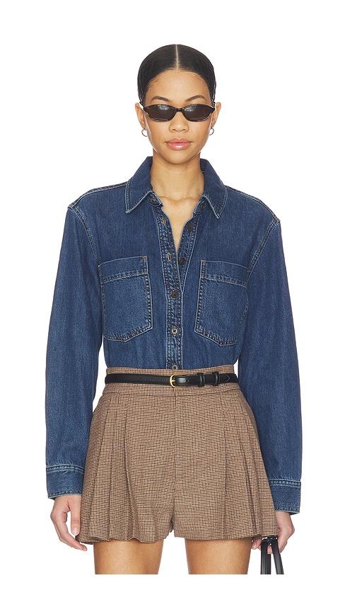 frame the polished shirt in blue.