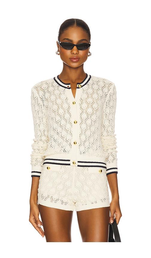 frame the rookie cardi in cream.
