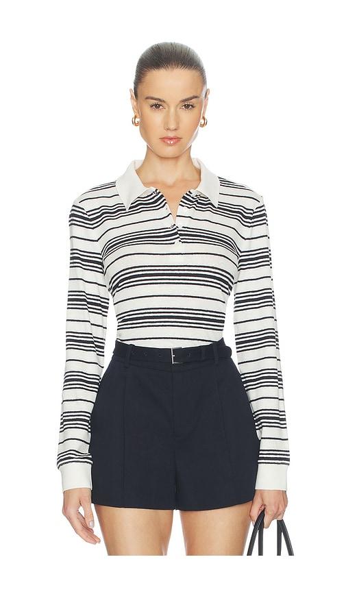 frame the striped long sleeve polo in black,white.