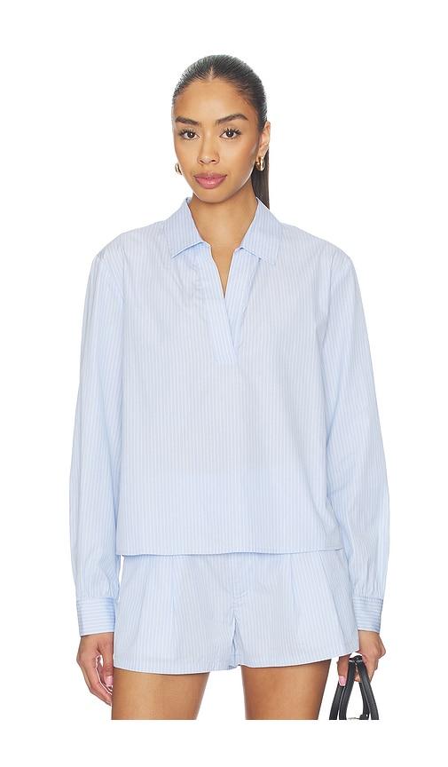 frame the striped long sleeve popover top in baby blue.