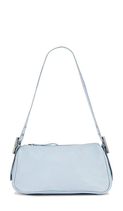 free people arm candy bag in baby blue.