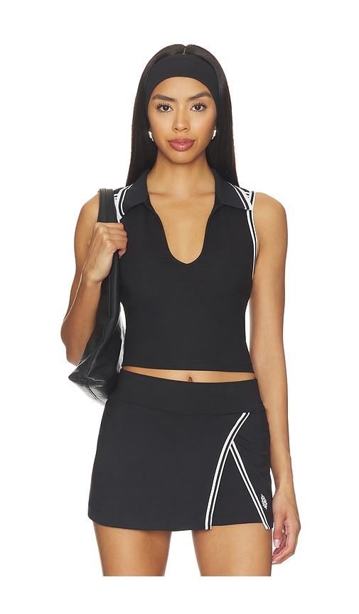 free people x fp movement forehand polo top in black.