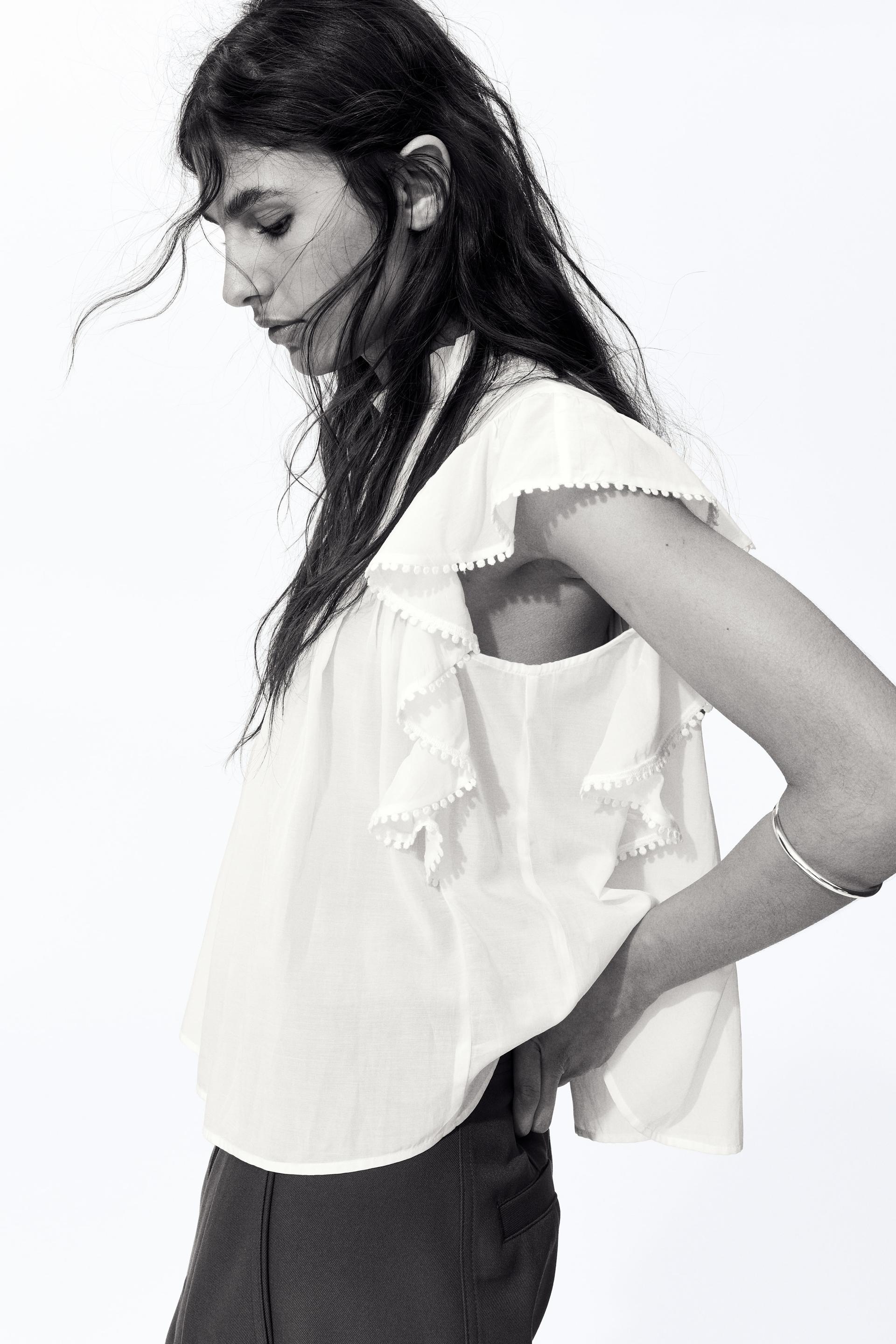 frill-trimmed blouse