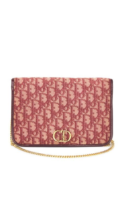 fwrd renew dior diorissimo clutch in red.