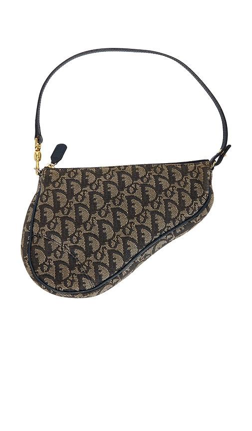 fwrd renew dior diorissimo saddle pochette shoulder bag in blue.