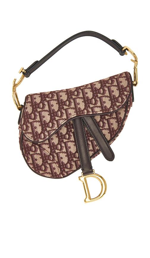 fwrd renew dior trotter oblique mini saddle bag in red.